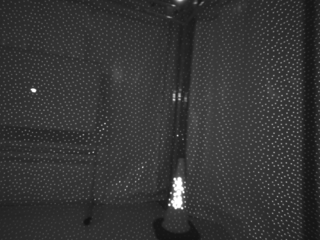 The same scene in active infrared, covered by the projected emitter pattern.